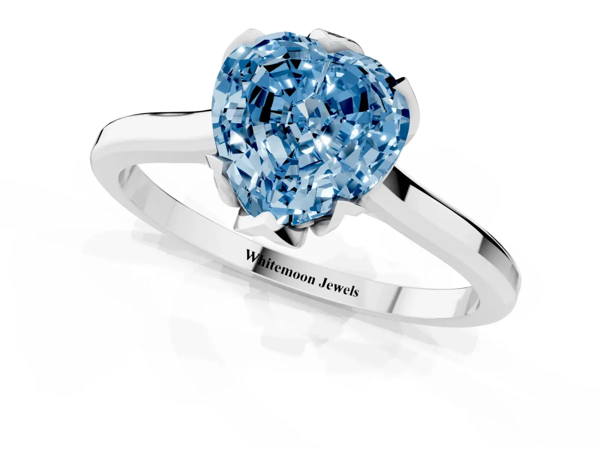 Fancy Blue Heart Cut Diamond Solitaire Ring with Flower Prong Setting and Classic Band Silver
