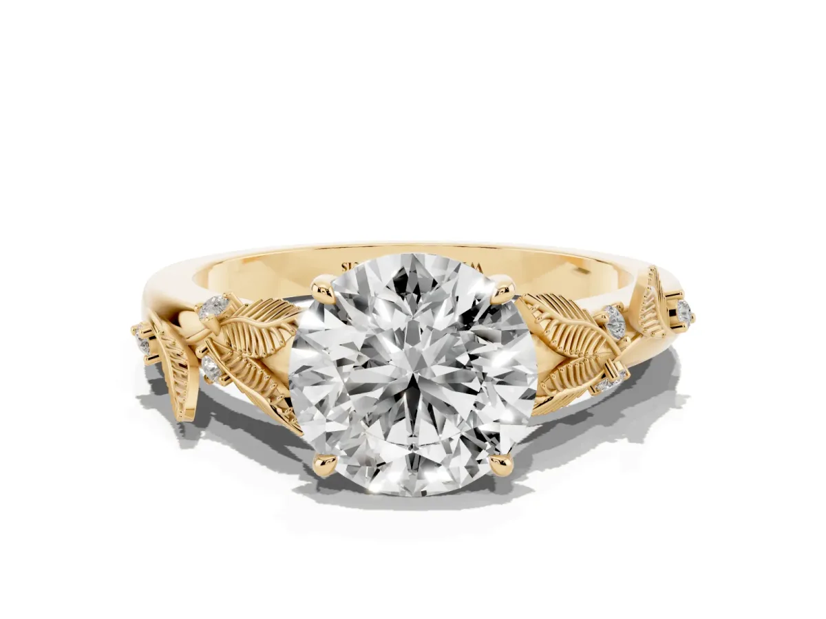 Round Cut Diamond Solitaire Ring with Leaf Motif Band and Four-Prong Setting Yellow gold