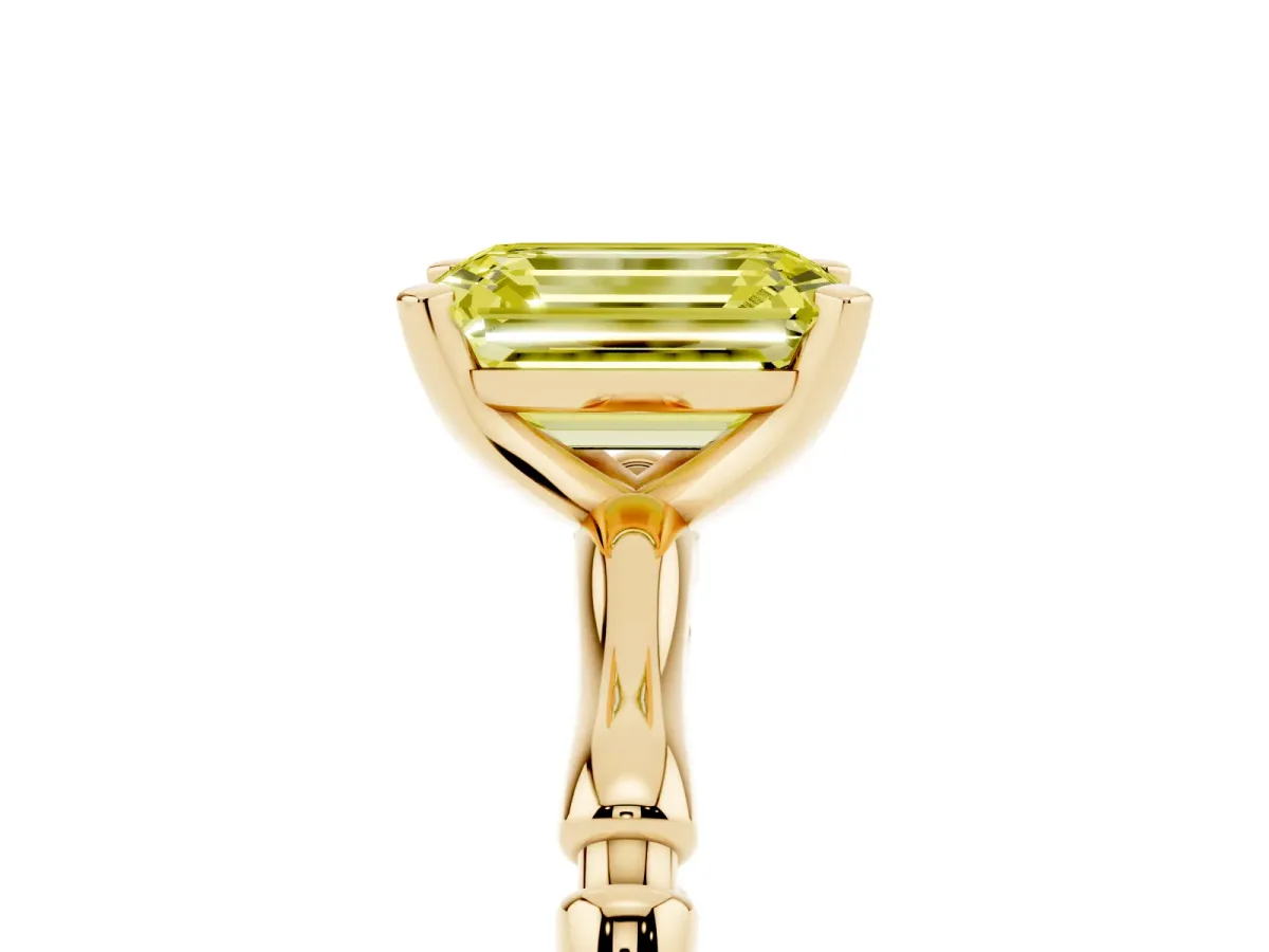 Fancy Yellow Emerald Cut Solitaire Diamond Ring with Bamboo Band and Four-Prong Setting Yellow gold