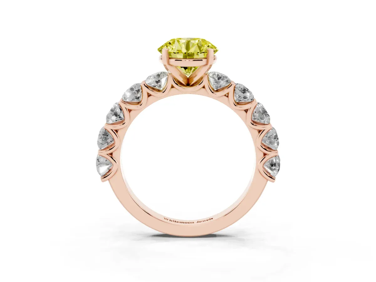 Fancy Yellow Round Cut Diamond Prong Setting with Side Stones on a Pave Band Rose gold
