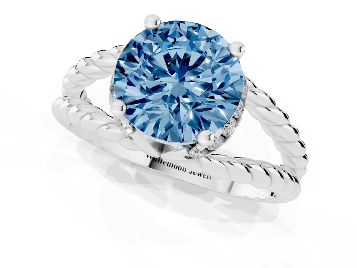 Fancy Blue Round Cut Halo Twisted Band Four-Prong Ring Platinum