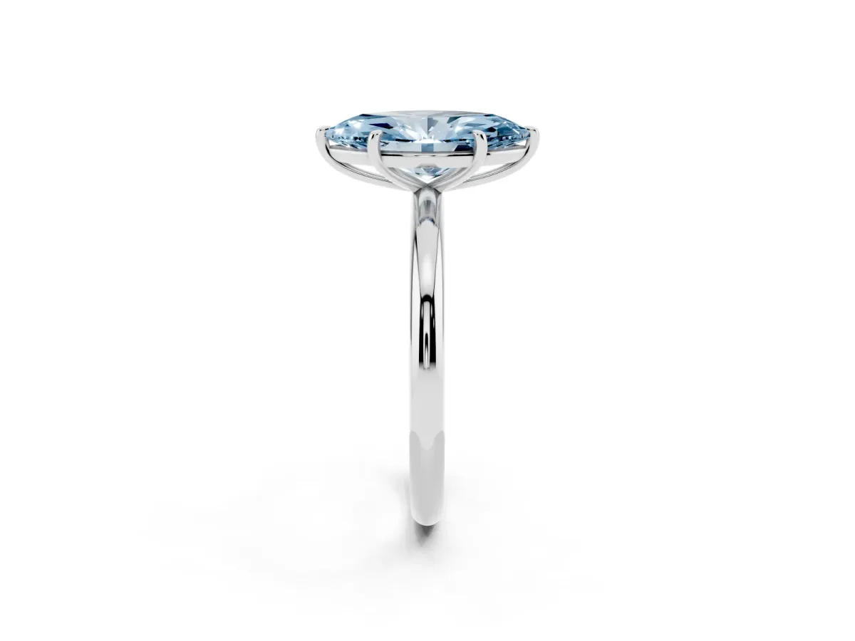 Fancy Blue Marquise Cut Solitaire Diamond Ring with Four-Prong Setting on a Plain Band Silver