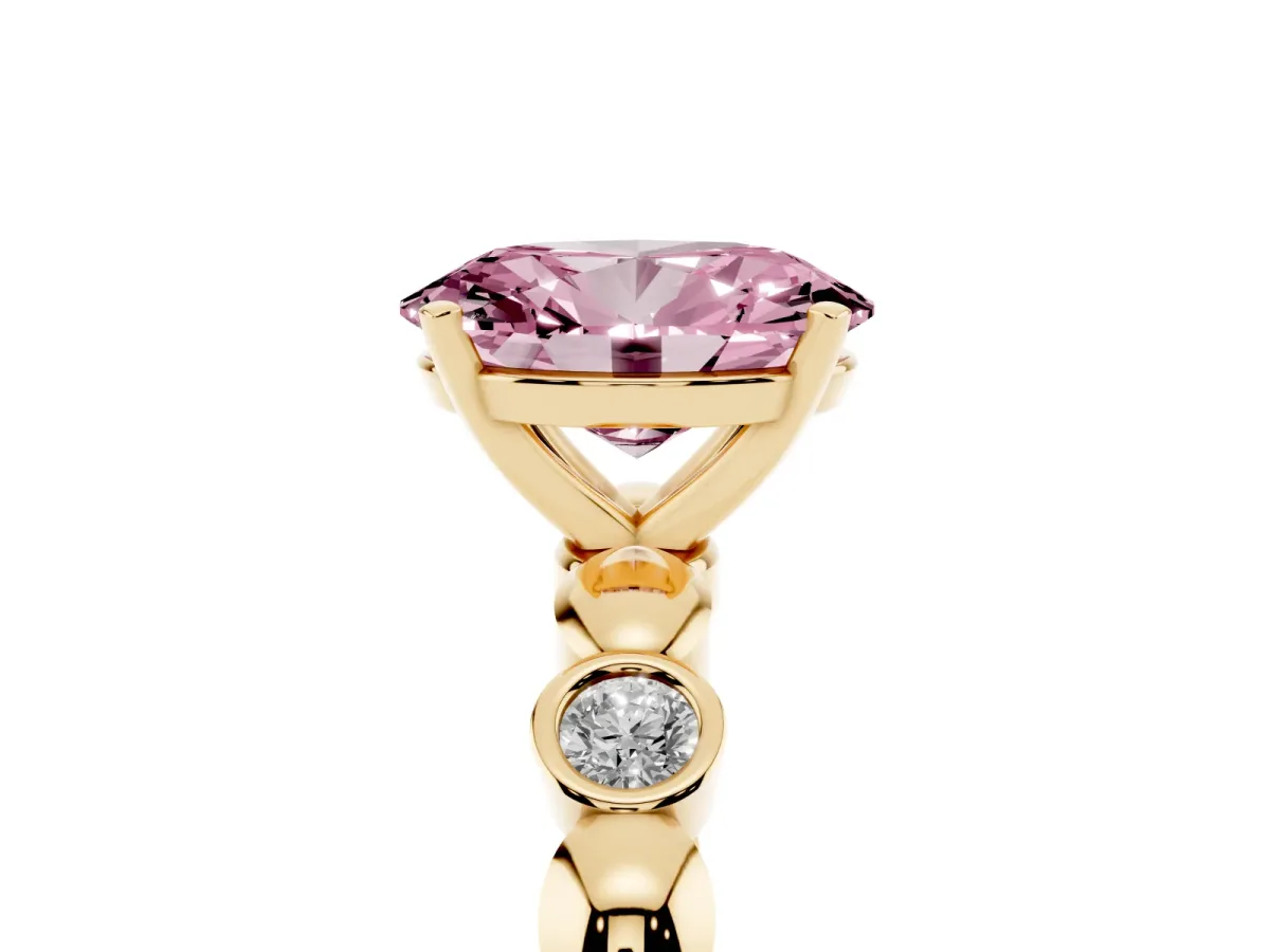 Fancy Pink Oval Cut Solitaire Bezel-Set Diamond Ring with Beaded Band and Four-Prong Setting Yellow gold
