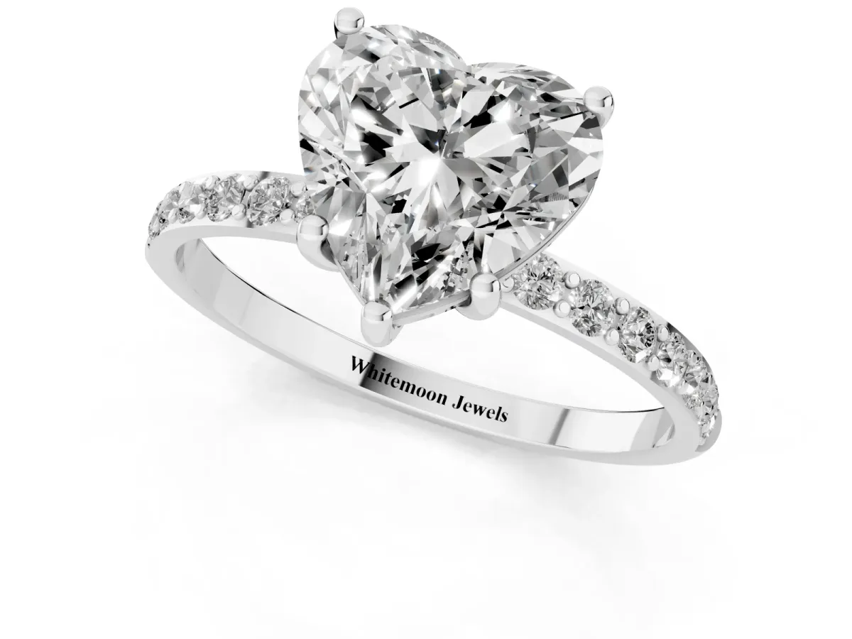 Heart Cut Diamond Solitaire Ring with Round Pavé Shoulders and Prong Setting Silver