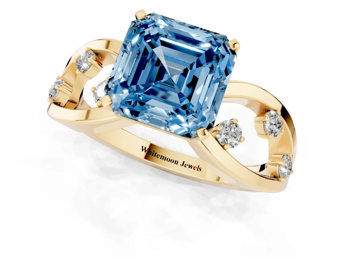 Fancy Blue Asscher Cut Cut Solitaire Diamond with Side Stones on Criss-Cross Band and Four-Prong Setting Yellow gold
