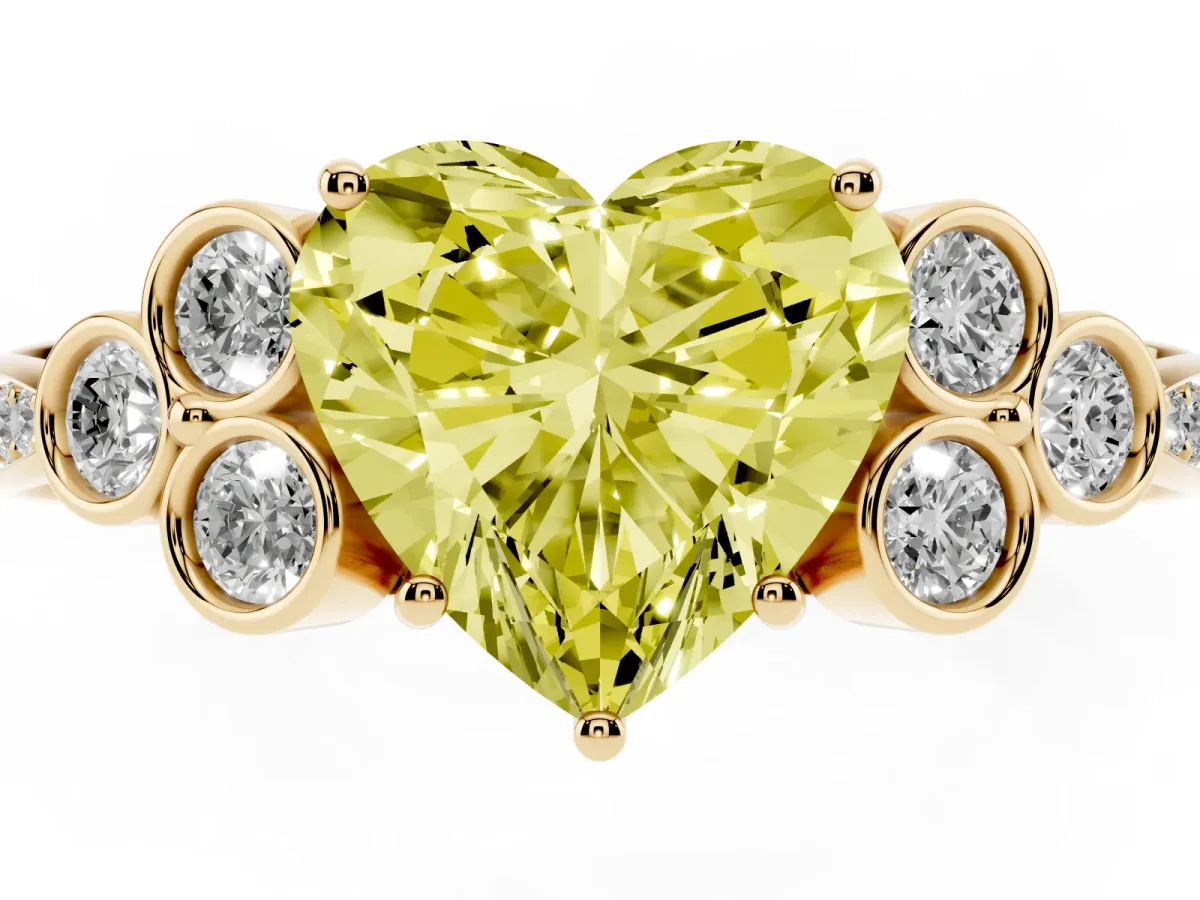 Fancy Yellow Heart Cut Cut Diamond Engagement Ring with Bezel Set Round Side Stones and Prong Setting Yellow gold