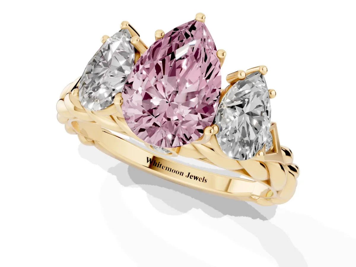 Fancy Pink Three-Stone Pear Cut Diamond Braided Band Ring with Four-Prong Setting Yellow gold
