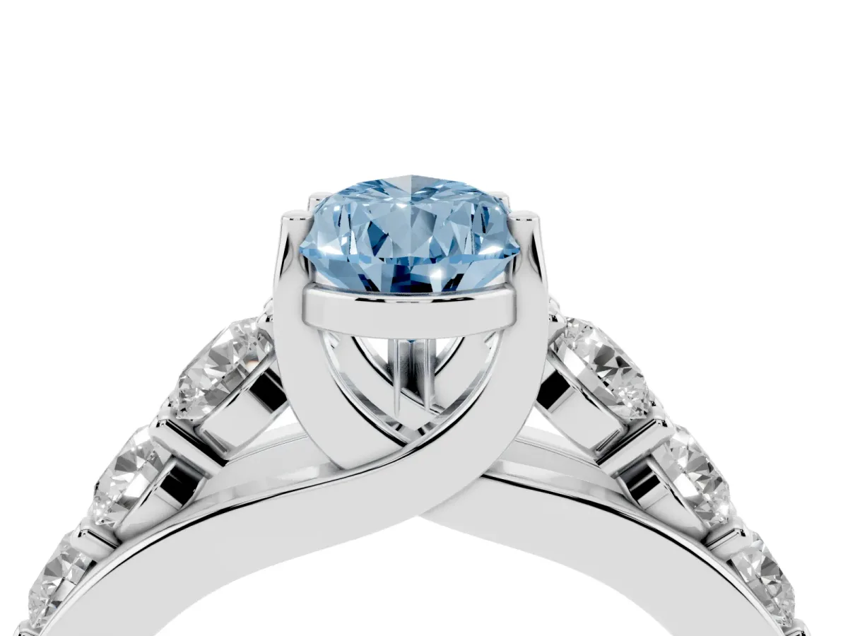 Fancy Blue Pear Cut Diamond Engagement Ring with Pavé Band and Four-Prong Setting Silver