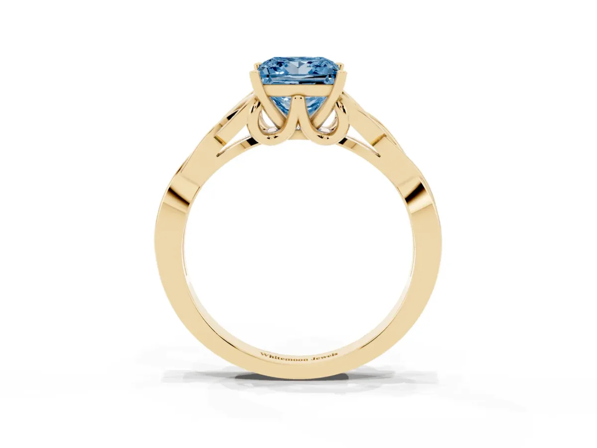 Fancy Blue Princess Cut Diamond Solitaire Engagement Ring with Celtic Knot Band and Four-Prong Setting Yellow gold