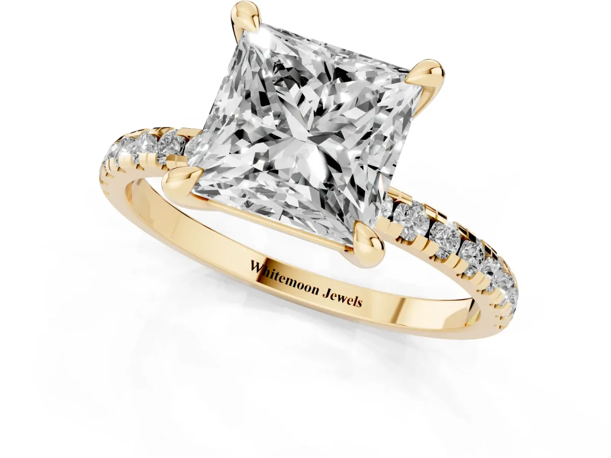 Princess Cut Diamond Brilliant Solitaire Ring with Pavé Band and Four-Prong Setting Yellow gold