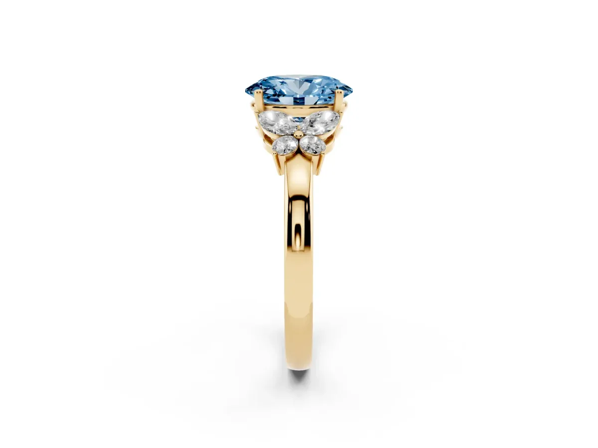Fancy Blue Oval Cut Cut Solitaire Floral Diamond Ring with Four-Prong Setting Yellow gold
