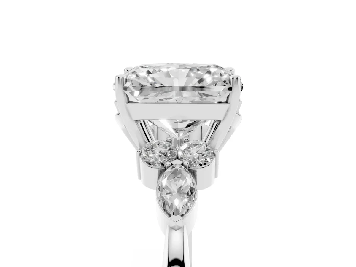 Radiant Cut Brilliant Diamond Solitaire Ring with Pear Side Stones and Four-Prong Setting Silver