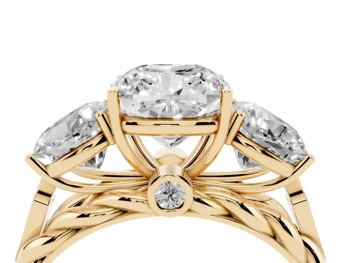 Three-Stone Cushion Cut Diamond Braided Band Ring with Four-Prong Setting Yellow gold