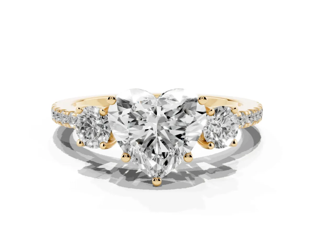Three-Stone Heart Cut Cut Diamond Pavé Band with Prong Setting Yellow gold