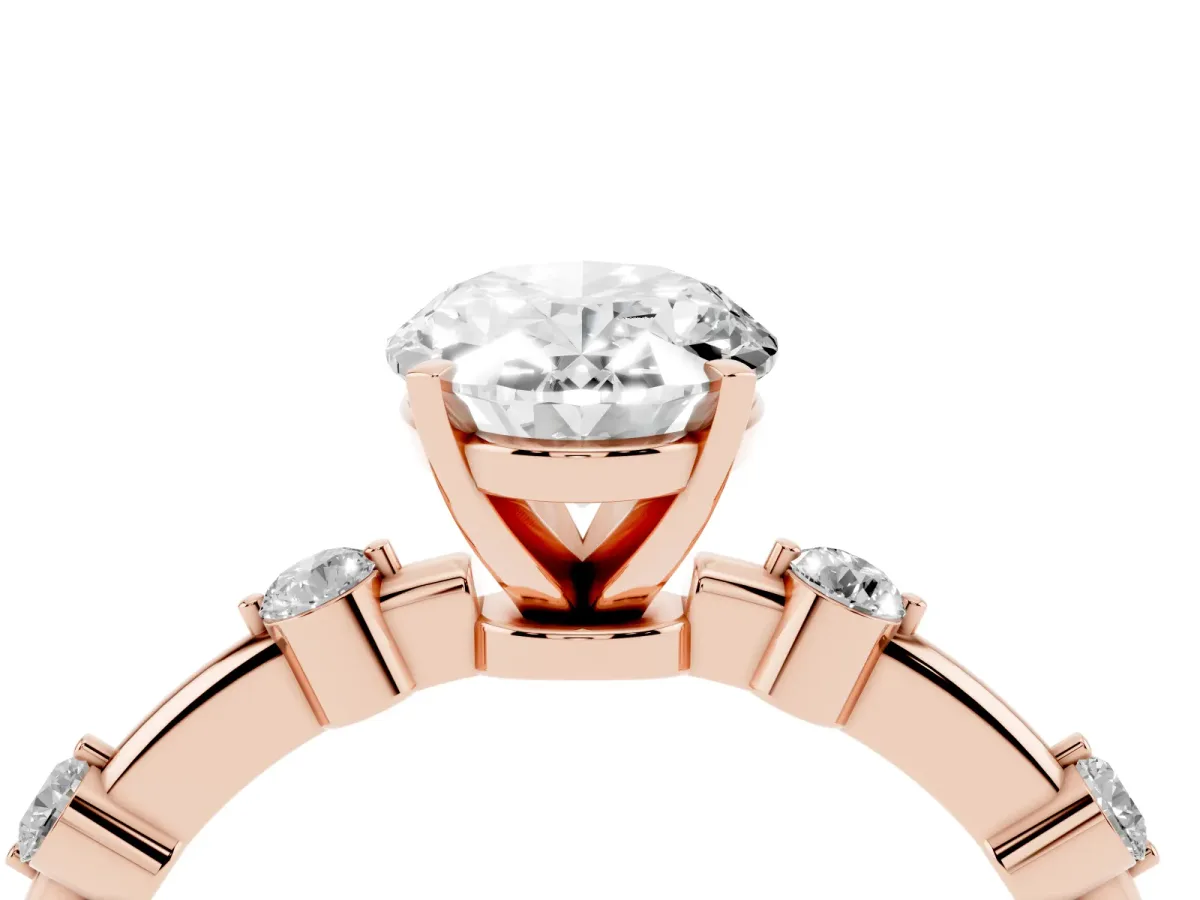 Oval Cut Solitaire Diamond Ring with Bezel Set Side Stones and Prong Setting Rose gold