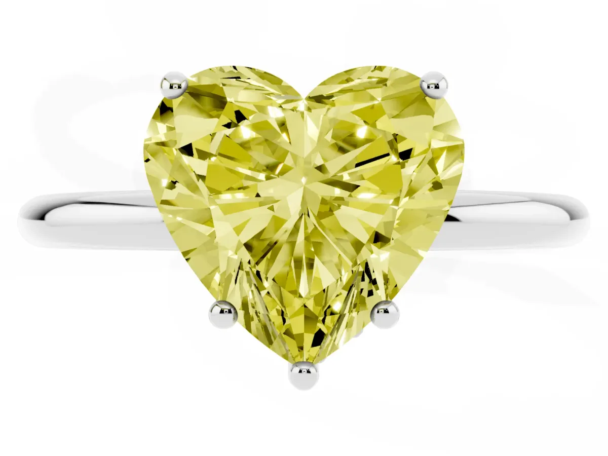 Fancy Yellow Heart Cut Solitaire Diamond Ring with a Classic Band and Four-Prong Setting Platinum