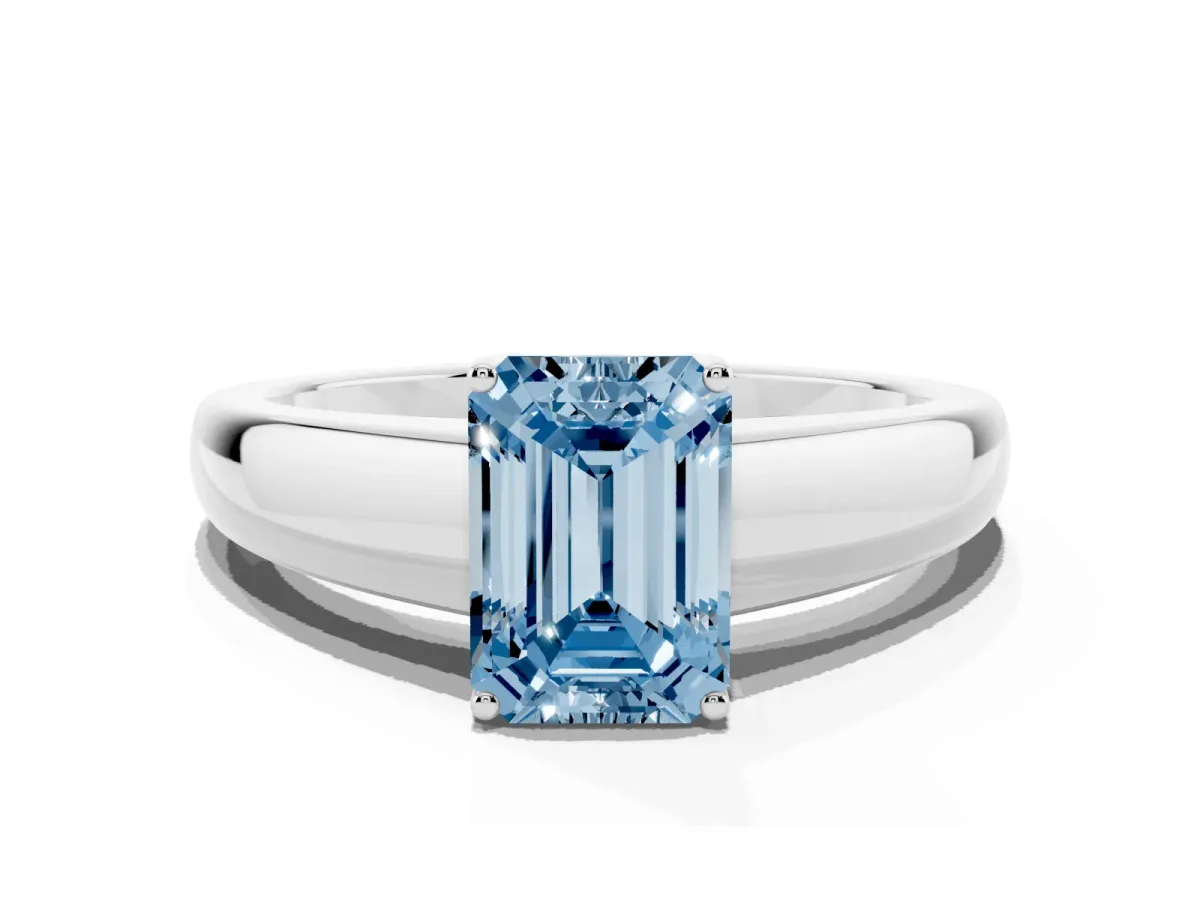 Fancy Blue Emerald Cut Solitaire Diamond Ring with Tapered Band and Four-Prong Setting Platinum