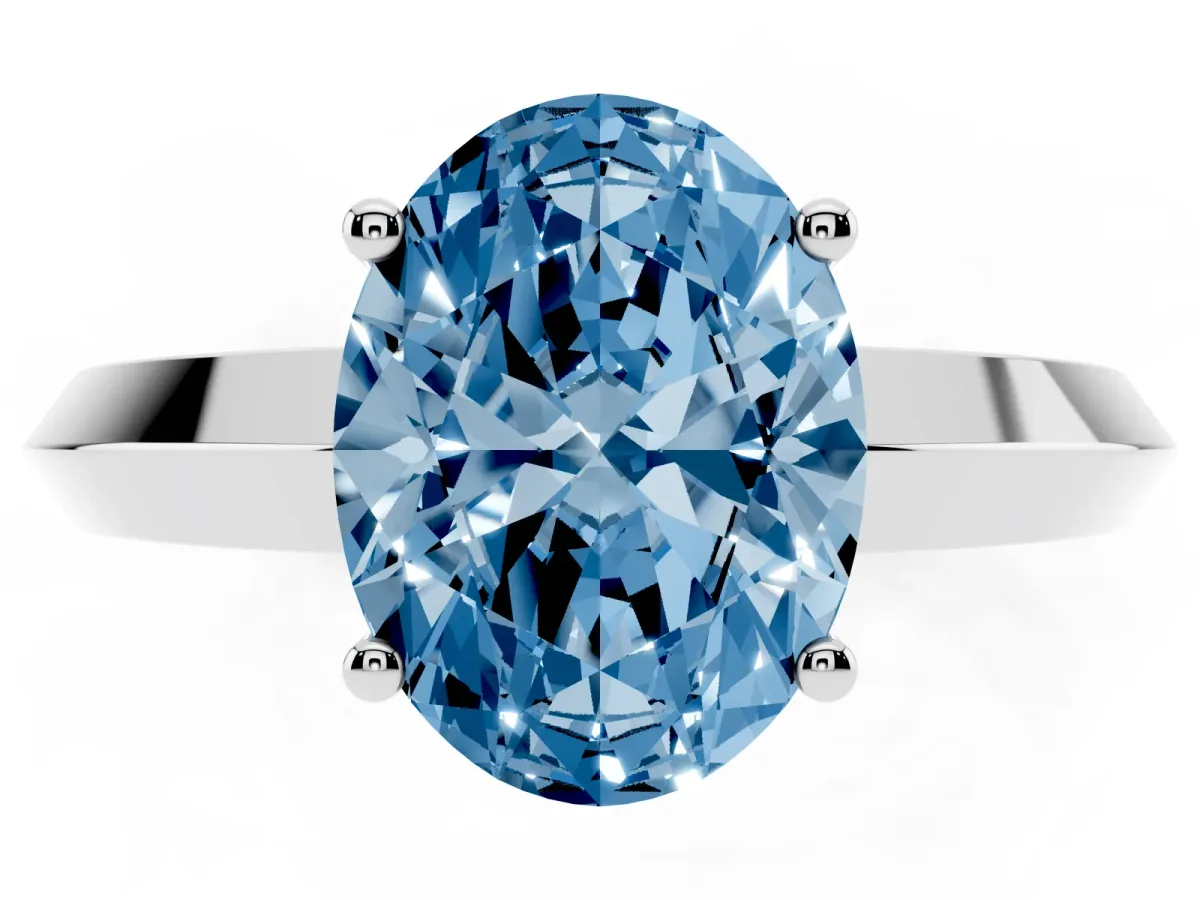 Fancy Blue Oval Cut Cut Solitaire Engagement Ring with Flat Band and Four-Prong Setting Platinum