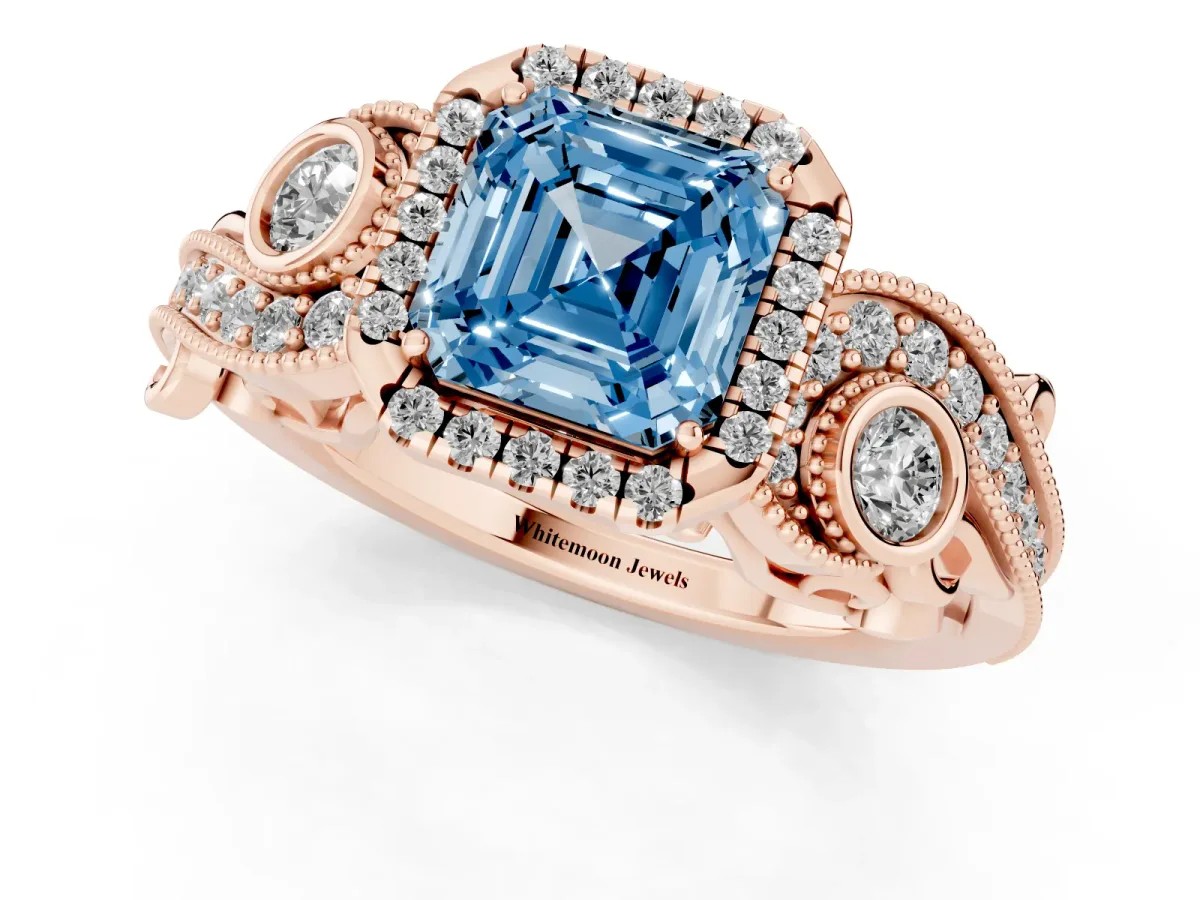 Fancy Blue Asscher Cut Halo Diamond Ring with Milgrain and Bezel Accents on a Split Shank Band Rose gold