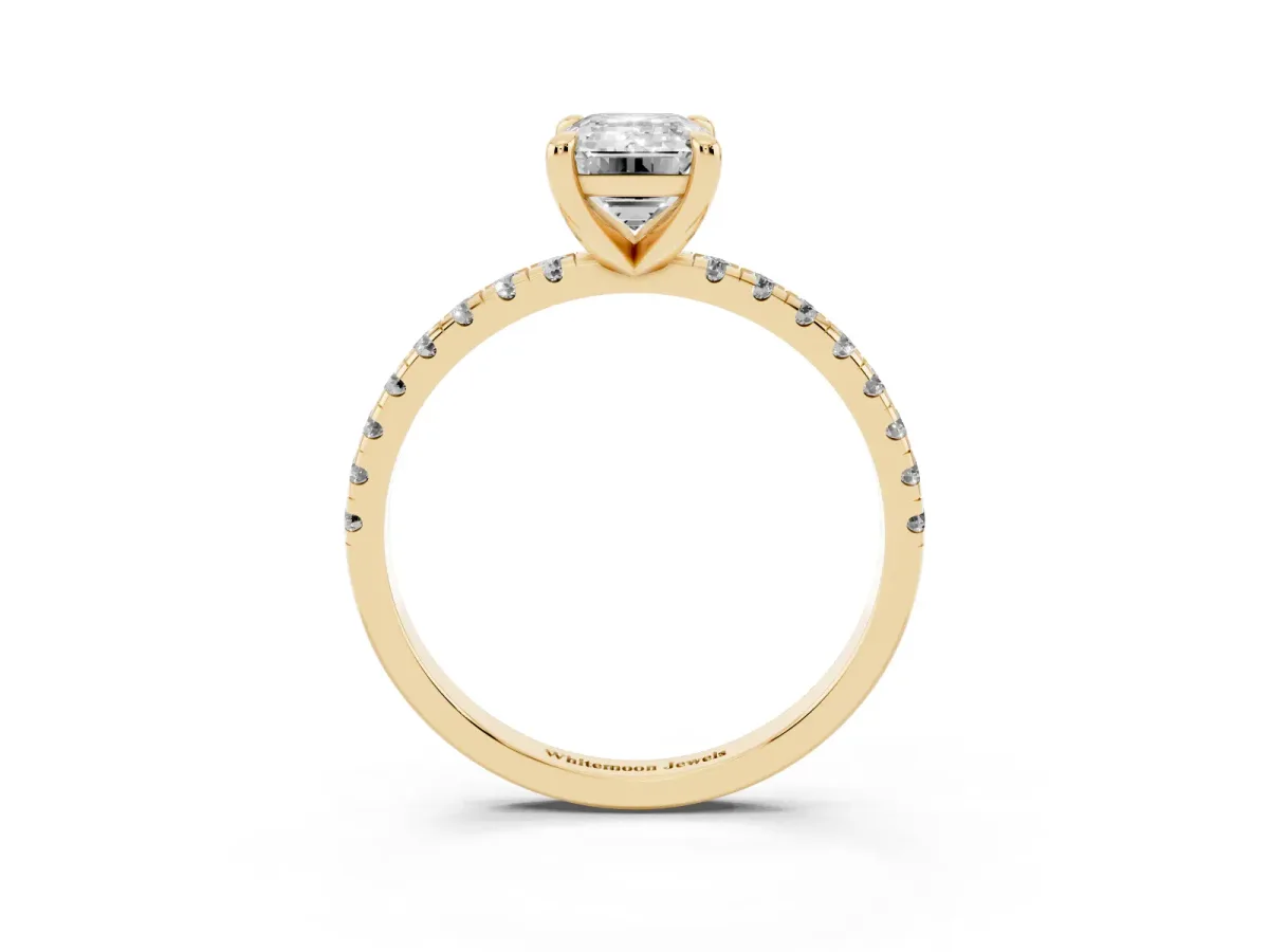 Emerald Cut Diamond Brilliant Solitaire Ring with Pavé Band and Four-Prong Setting Yellow gold