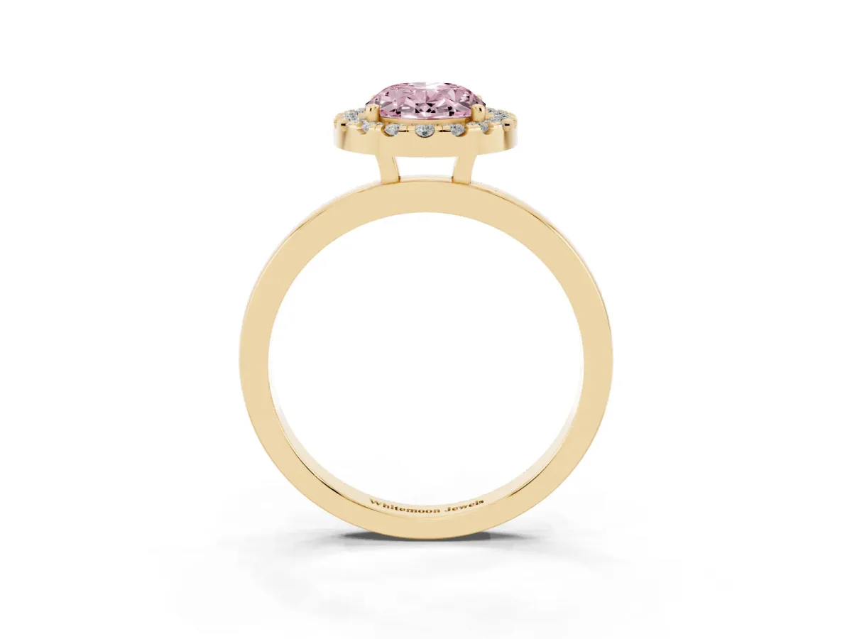Fancy Pink Oval Cut Halo Diamond Solitaire with Pavé Band and Four-Prong Setting Yellow gold