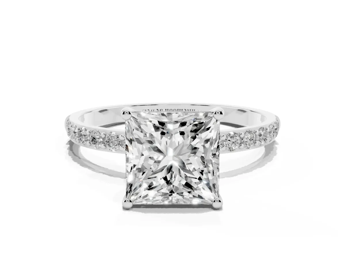 Princess Cut Diamond Solitaire Ring with Round Pavé Shoulders and Prong Setting Silver