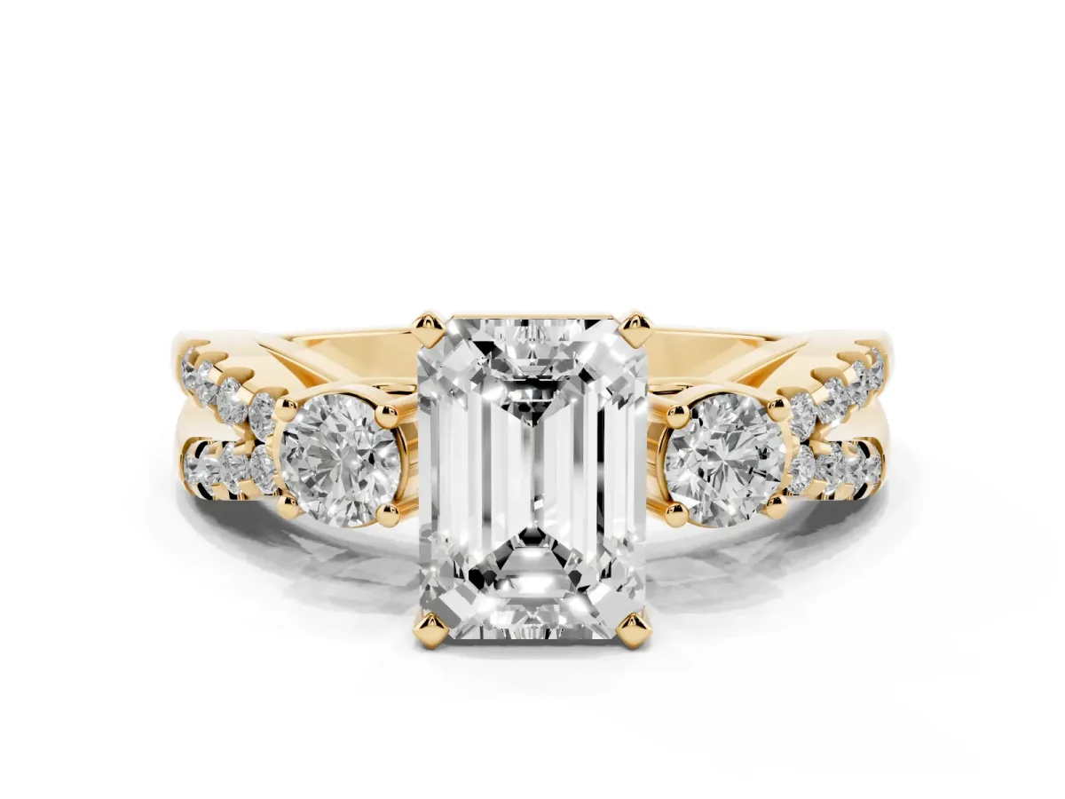 Emerald Cut Diamond Three-Stone Ring with Pavé Split Shank and Four-Prong Setting Yellow gold