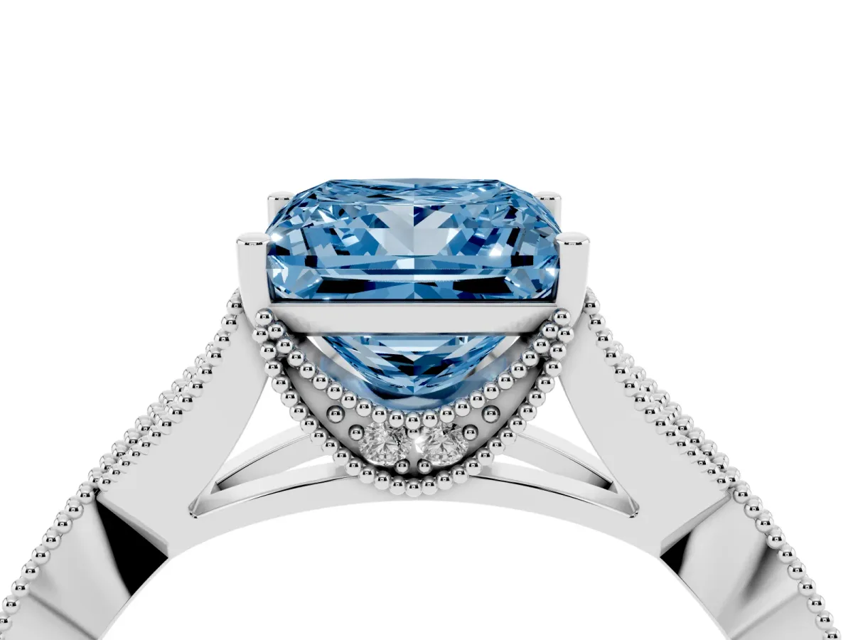 Fancy Blue Princess Cut Cut Diamond Twisted Band with Milgrain Pave Setting and Four-Prong Setting Platinum