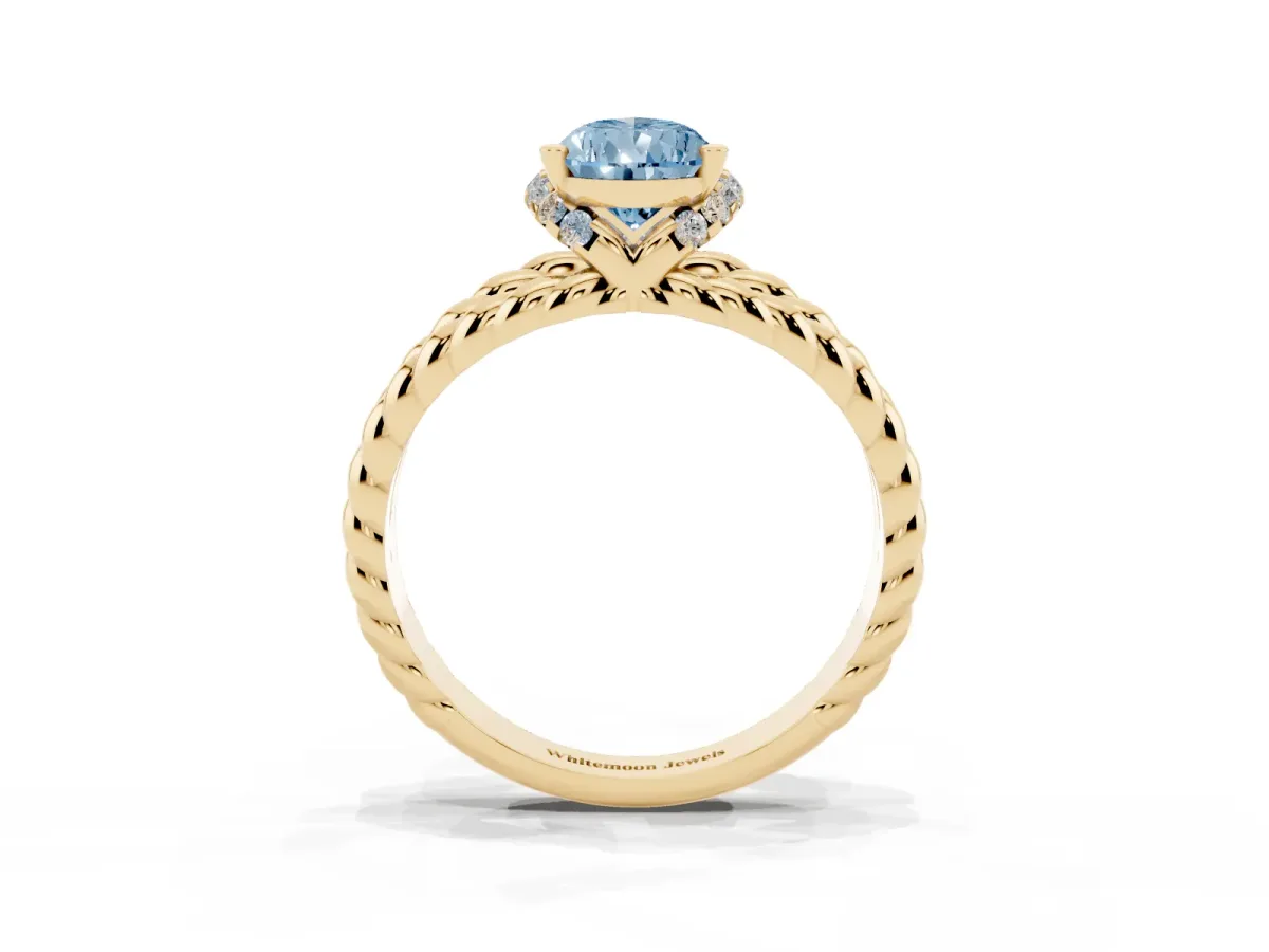 Fancy Blue Pear Cut Halo Twisted Band Four-Prong Ring Yellow gold