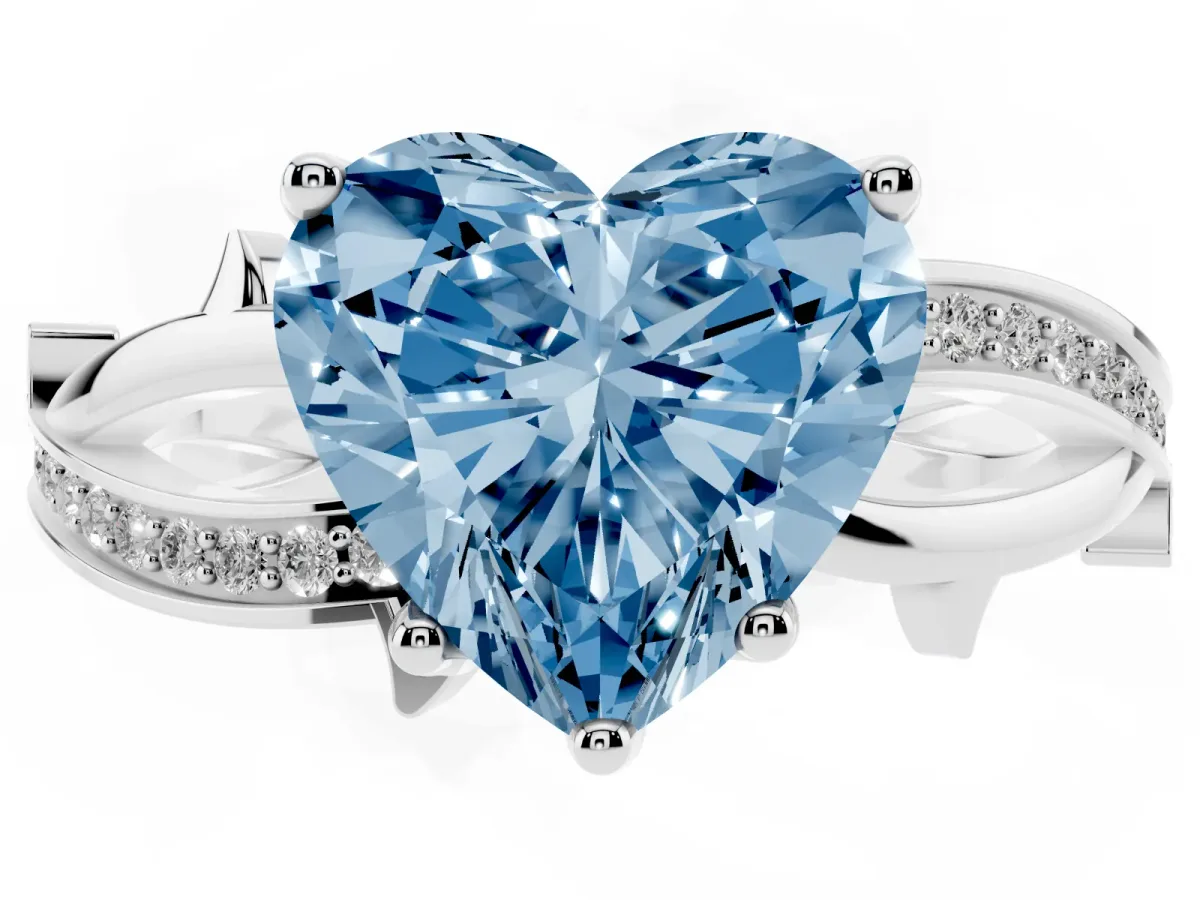 Fancy Blue Heart Cut Solitaire Twist Band with Pavé Accents and Four-Prong Setting Silver