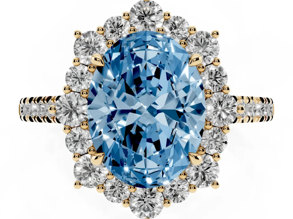 Fancy Blue Oval Cut Halo Diamond Ring with Pavé Band and Prong Setting Yellow gold