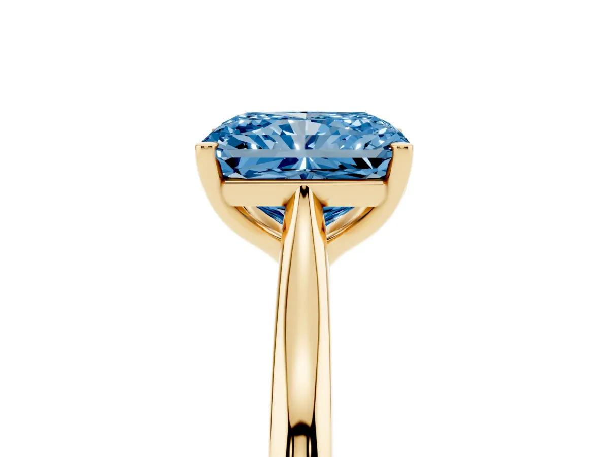 Fancy Blue Radiant Cut Cut Solitaire Ring with Cathedral Band and Four-Prong Setting Yellow gold