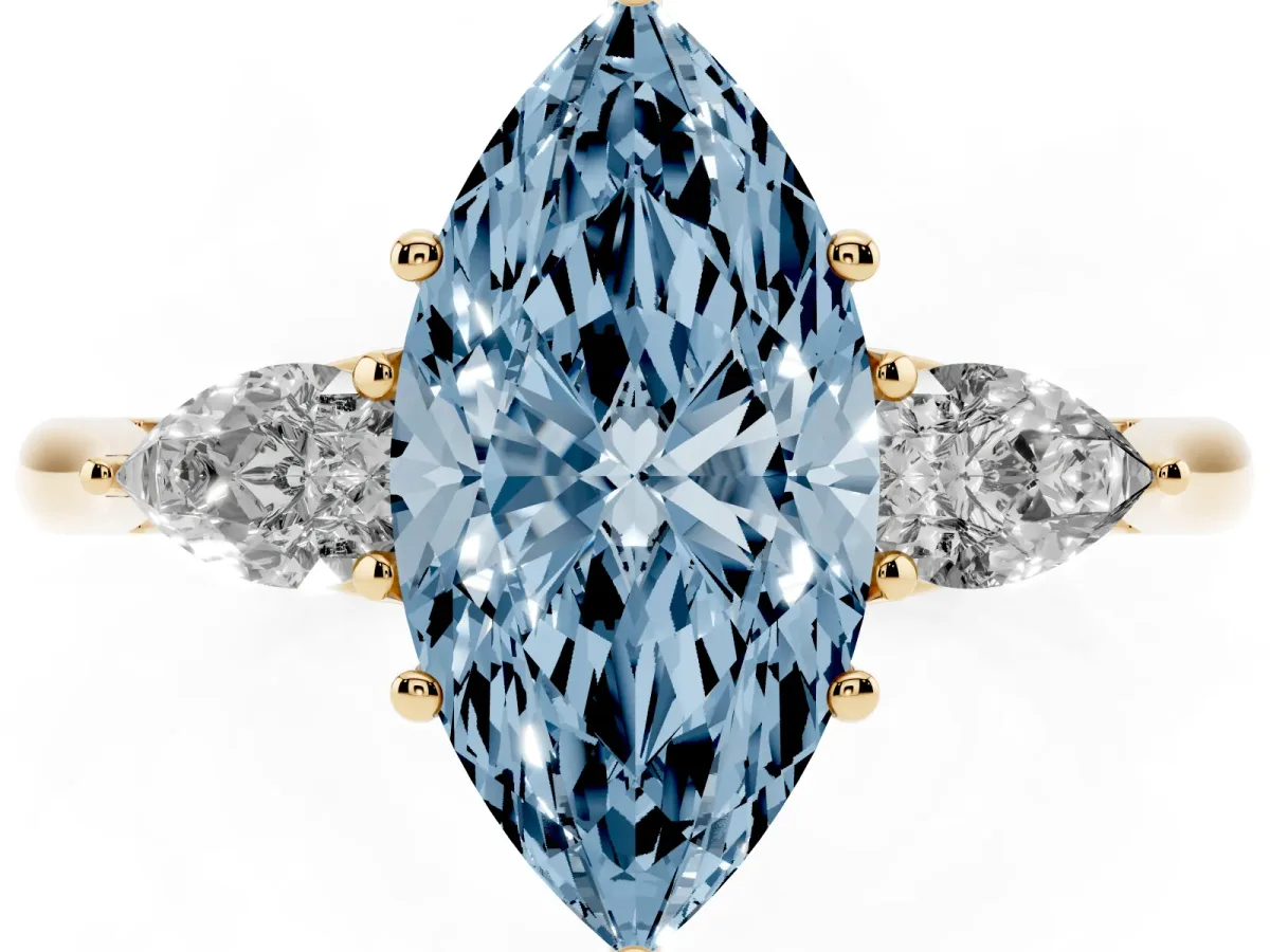 Fancy Blue Three-Stone Marquise Cut Brilliant Diamond Solitaire Ring with Tapered Band and Four-Prong Setting Yellow gold