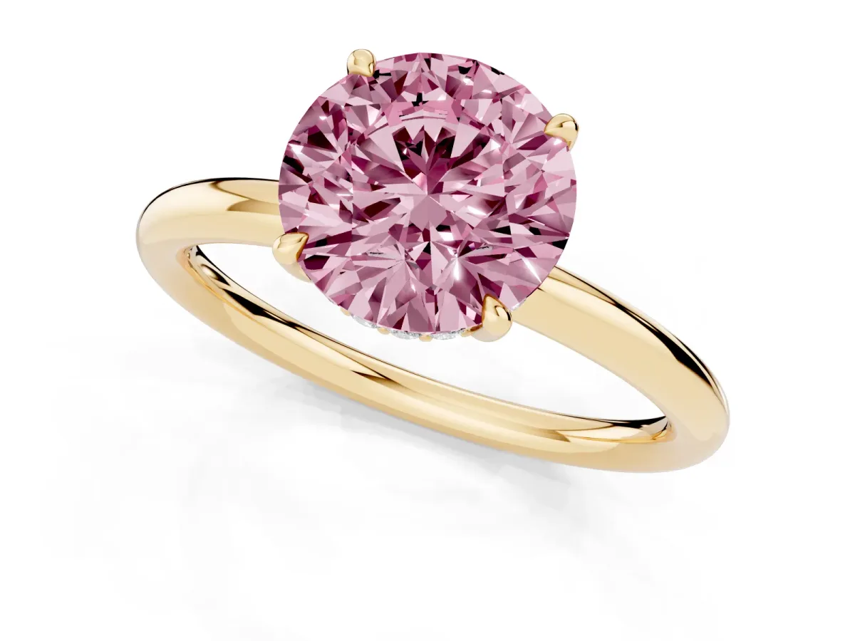 Fancy Pink Round Cut Diamond Solitaire Ring with Thin Band and Four-Prong Setting Yellow gold