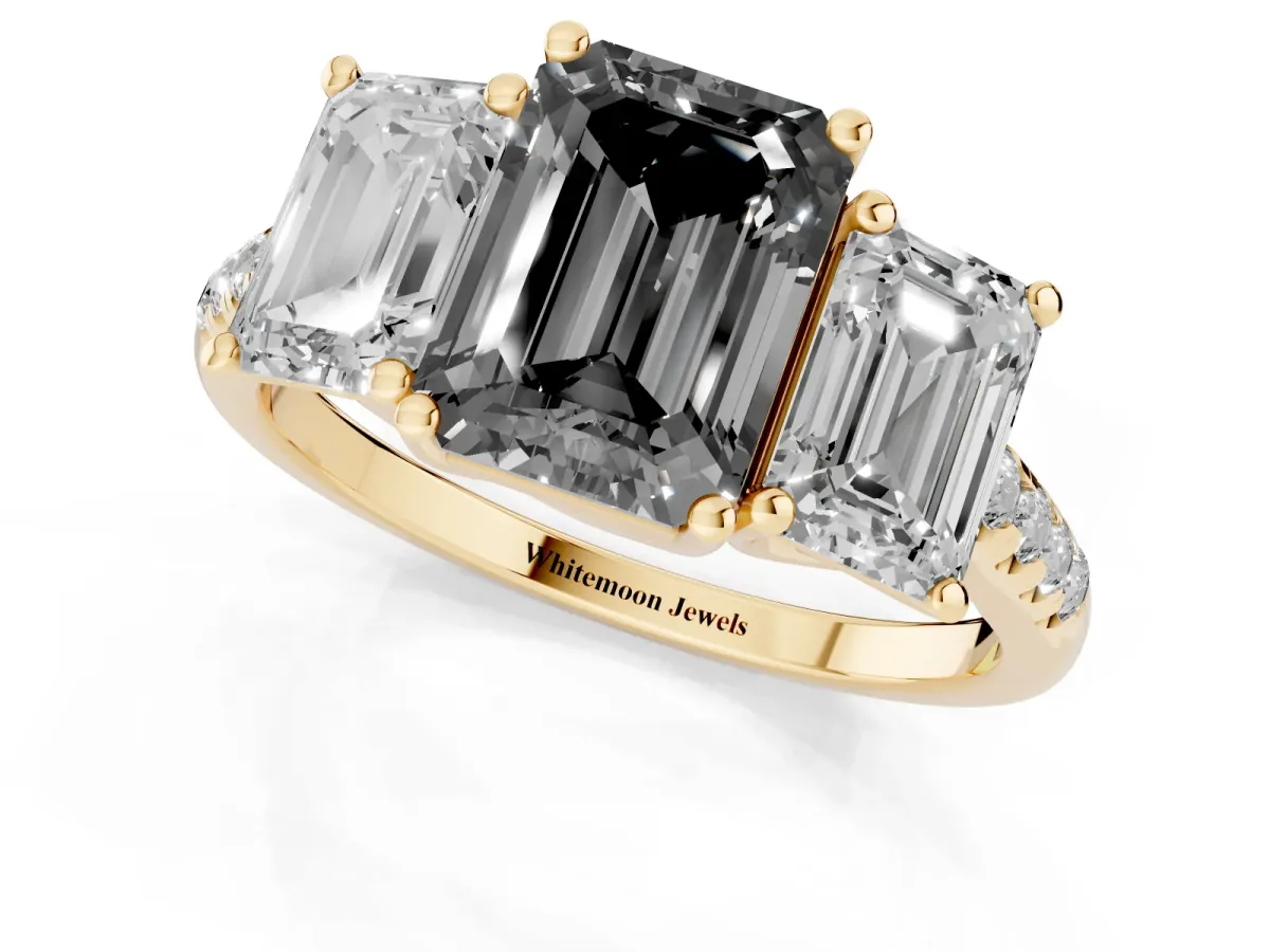 Fancy Black Three-Stone Emerald Cut Diamond Ring with Round Pavé Band and Prong Setting Yellow gold