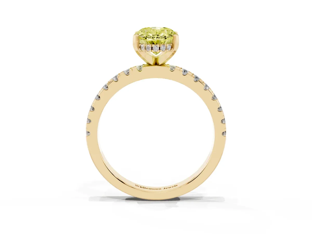 Fancy Yellow Oval Cut Diamond Solitaire Ring with Round Pavé Band and Four-Prong Setting Yellow gold