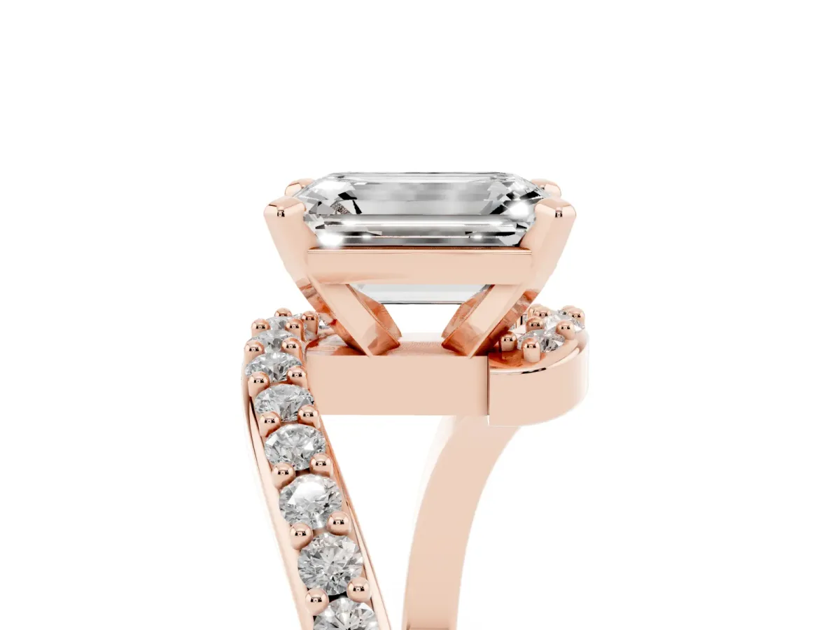Emerald Cut Solitaire Twist Band with Pave Set Diamonds and Four-Prong Setting Rose gold