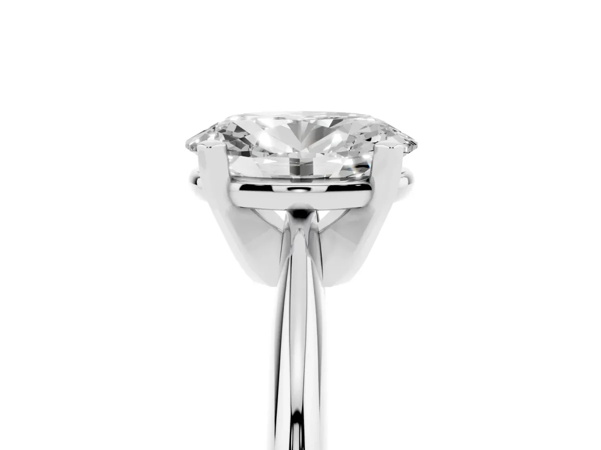 Oval Cut Cut Solitaire Ring with Four-Prong Setting on a Classic Band Platinum
