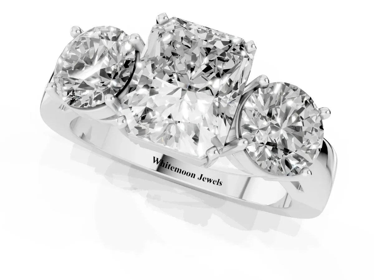 Three-Stone Radiant Cut Diamond Ring with Round Side Stones, Classic Band, and Four-Prong Setting White gold