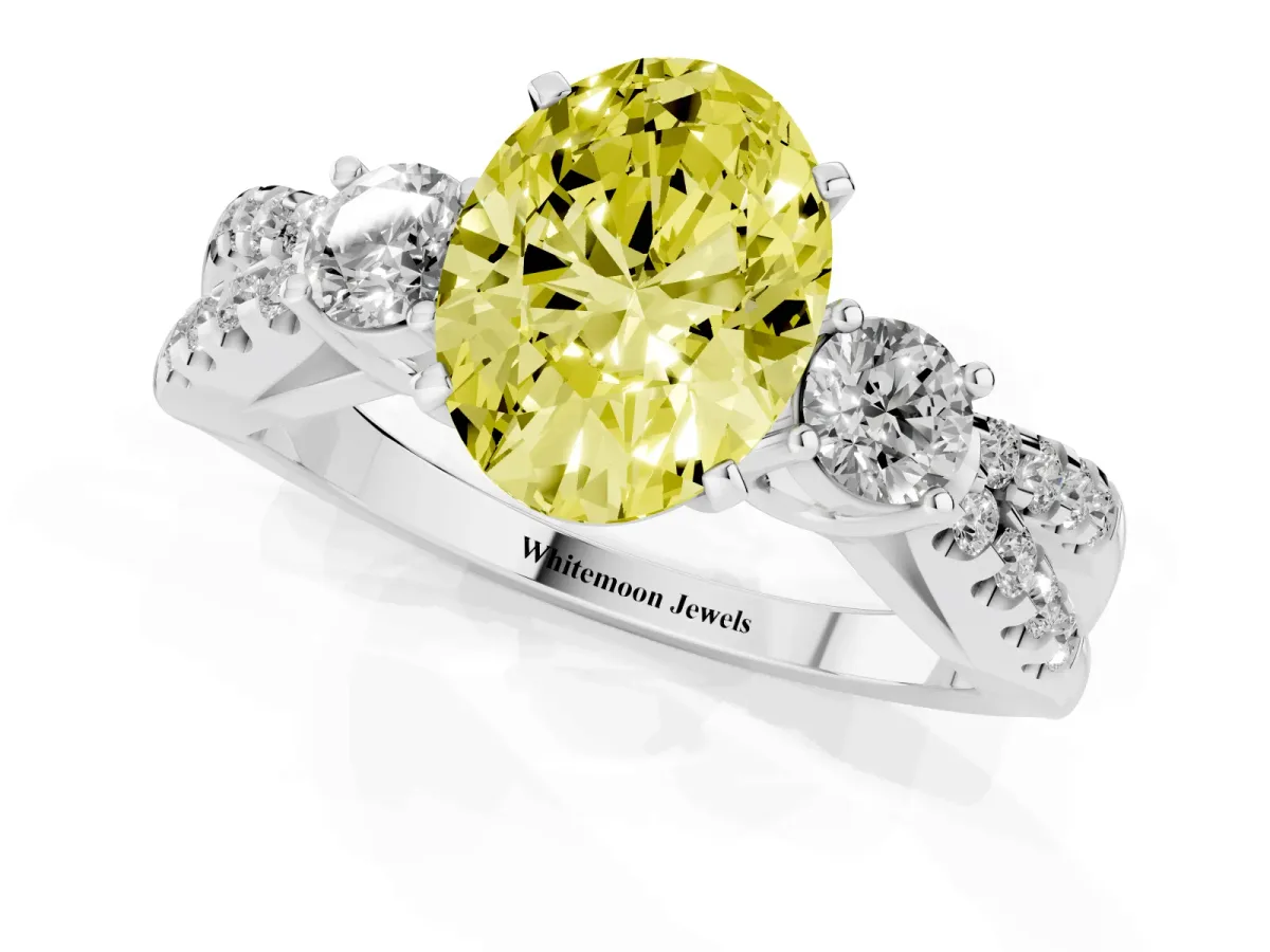 Fancy Yellow Oval Cut Diamond Three-Stone Ring with Pavé Split Shank and Four-Prong Setting Silver