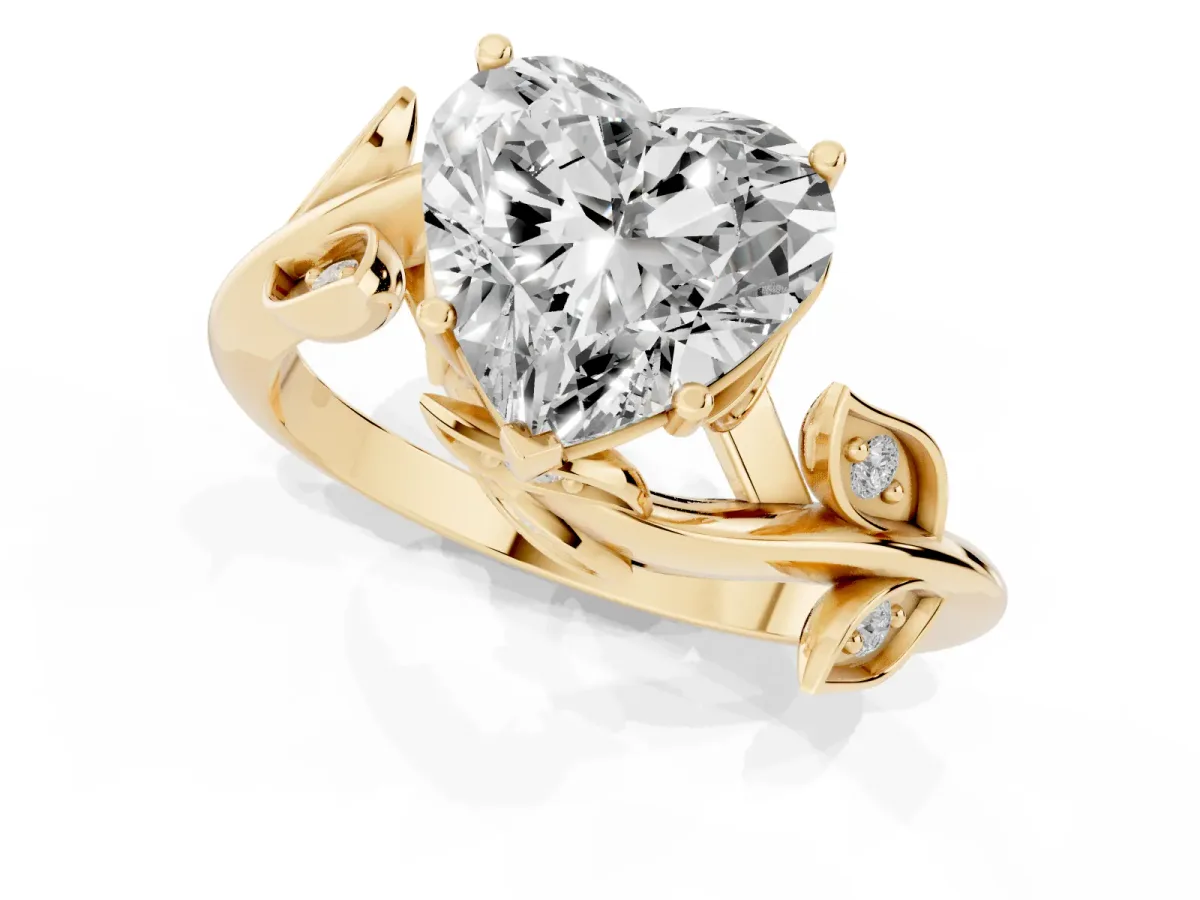 Heart Cut Solitaire Twist Engagement Ring with Leaf Accents and Prong Setting Yellow gold