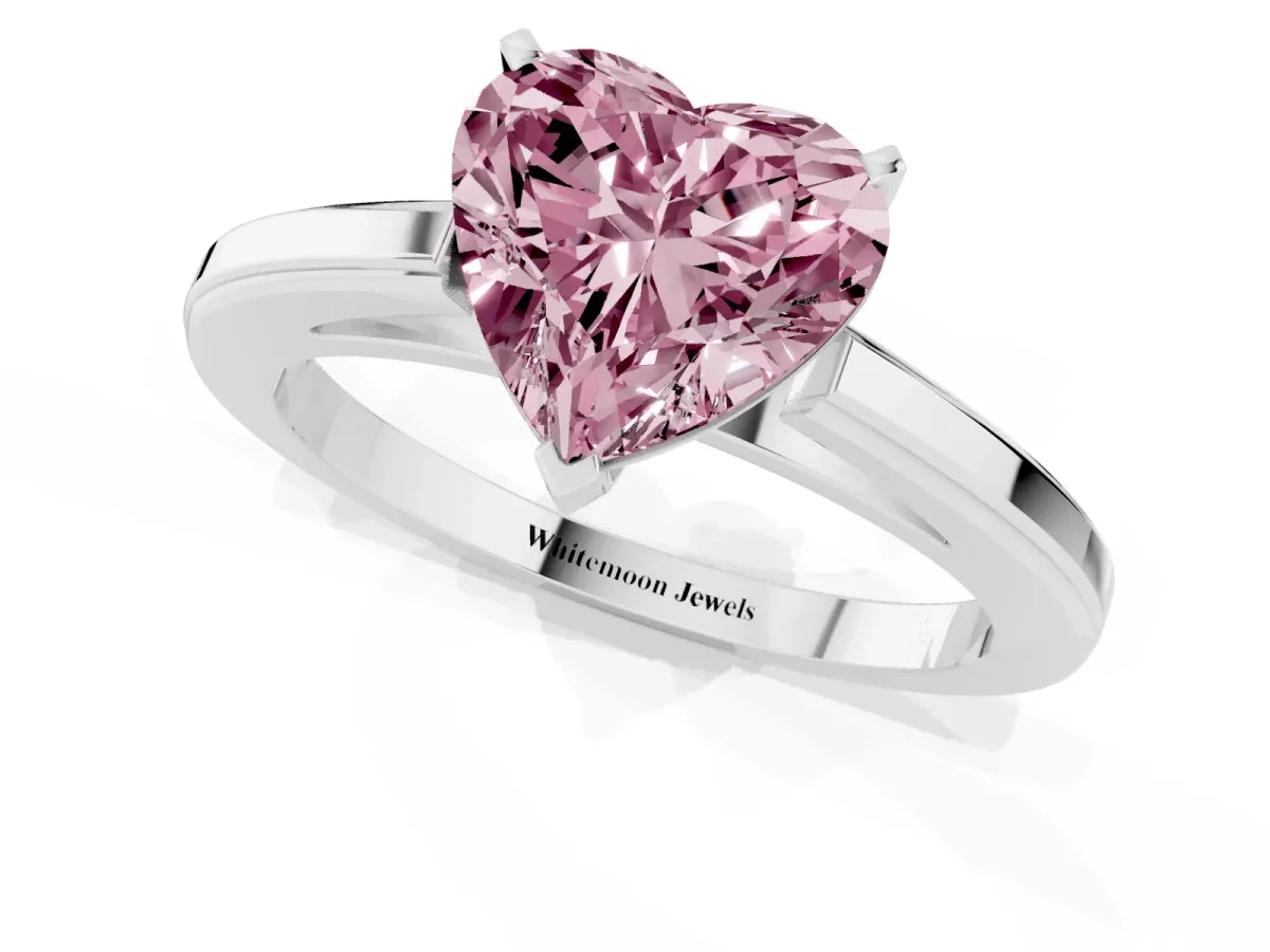 Fancy Pink Heart Cut Solitaire Diamond Ring with Four-Prong Setting and Classic Band Silver