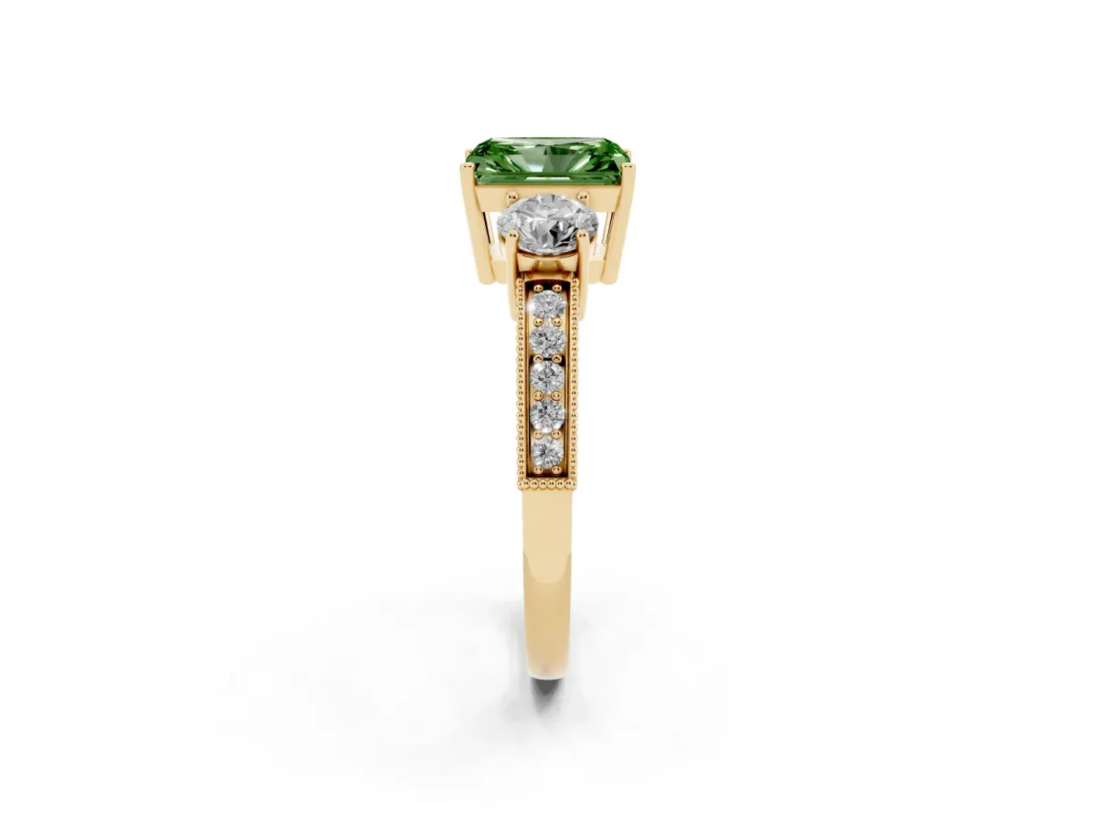 Fancy Green Radiant Cut Three-Stone Diamond Ring with Pavé Band and Four-Prong Setting Yellow gold