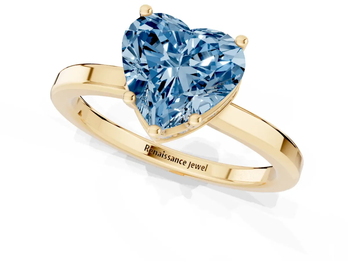 Fancy Blue Heart Cut Cut Solitaire Engagement Ring with Four-Prong Setting on a Classic Band Yellow gold