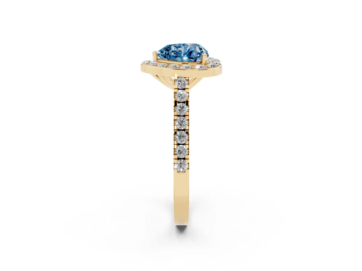 Fancy Blue Heart Cut Diamond Halo Ring with Round Pavé Split Shank and Prong Setting Yellow gold