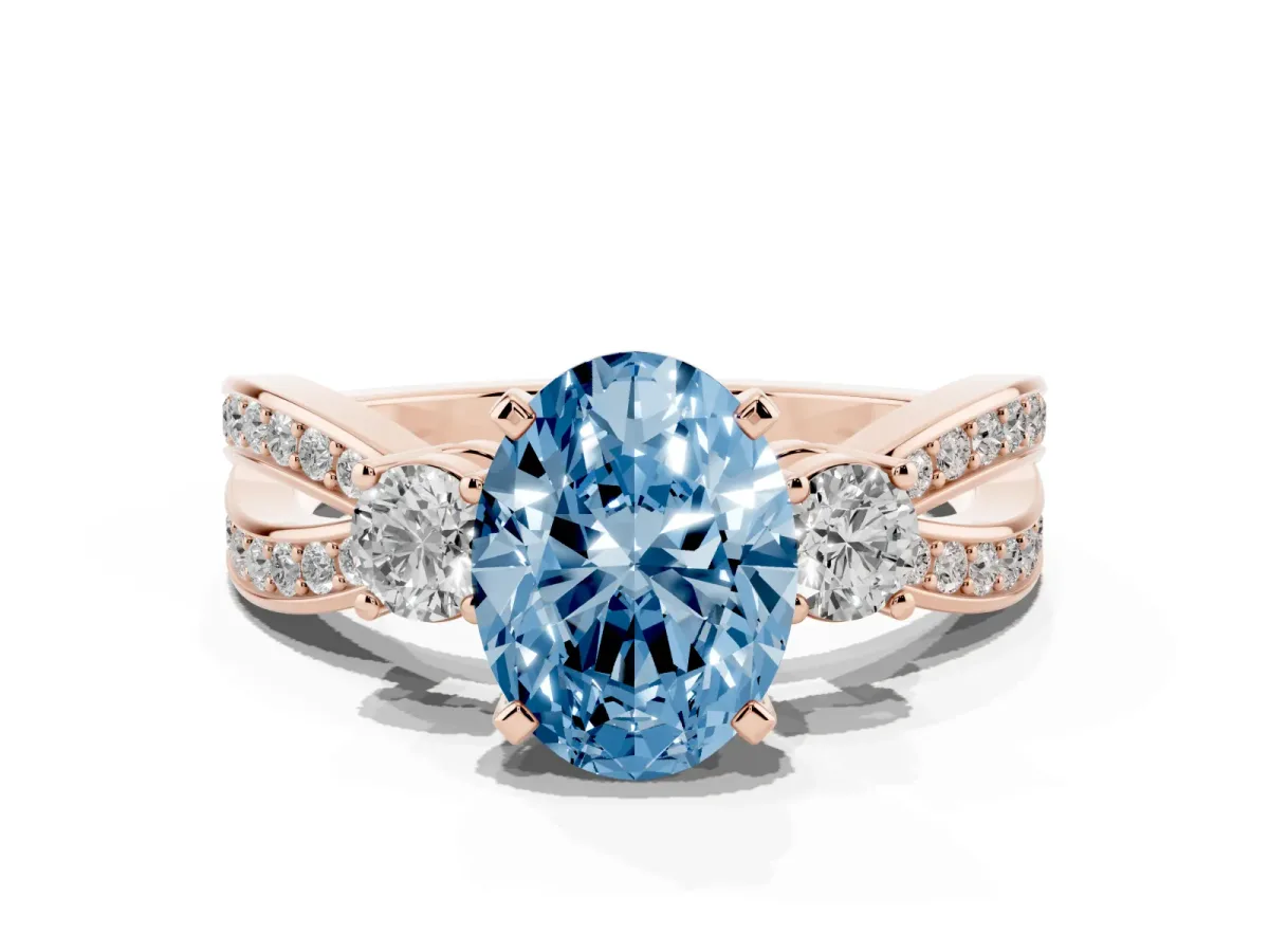 Fancy Blue Three-Stone Oval Cut Cut Diamond Twist Band with Prong Setting Rose gold