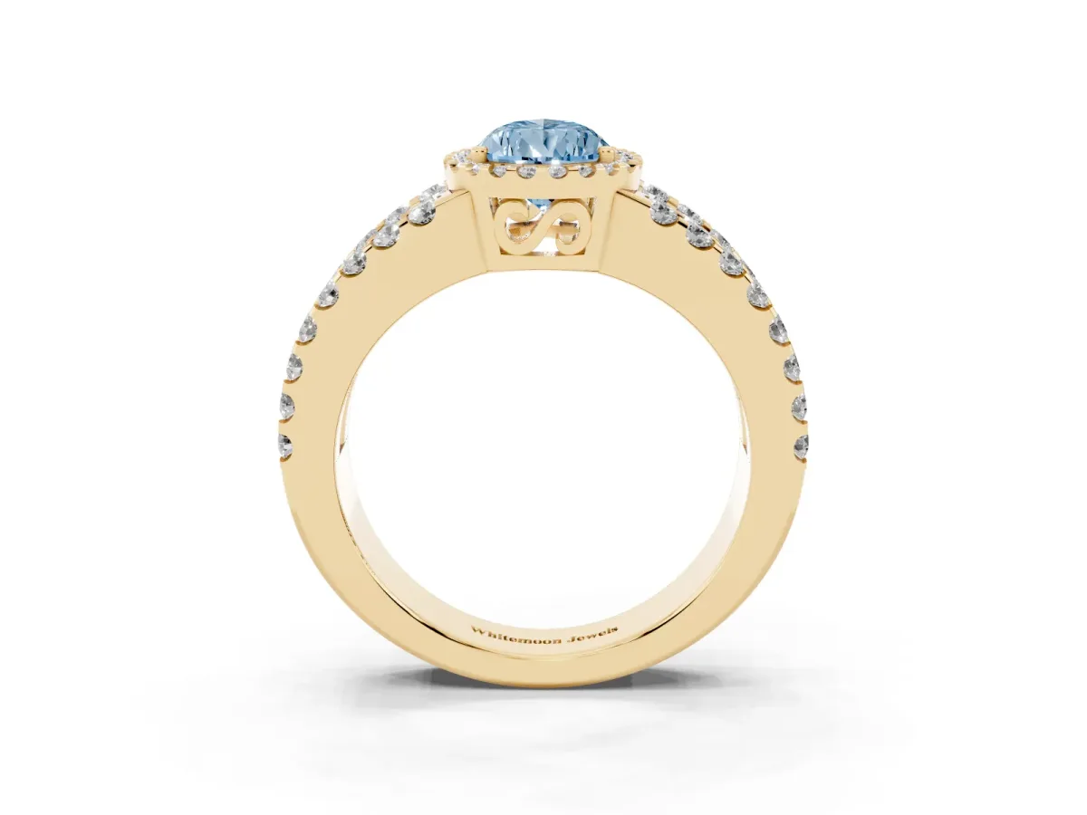 Fancy Blue Pear Cut Cut Halo Split Shank Diamond Ring with Four-Prong Setting Yellow gold