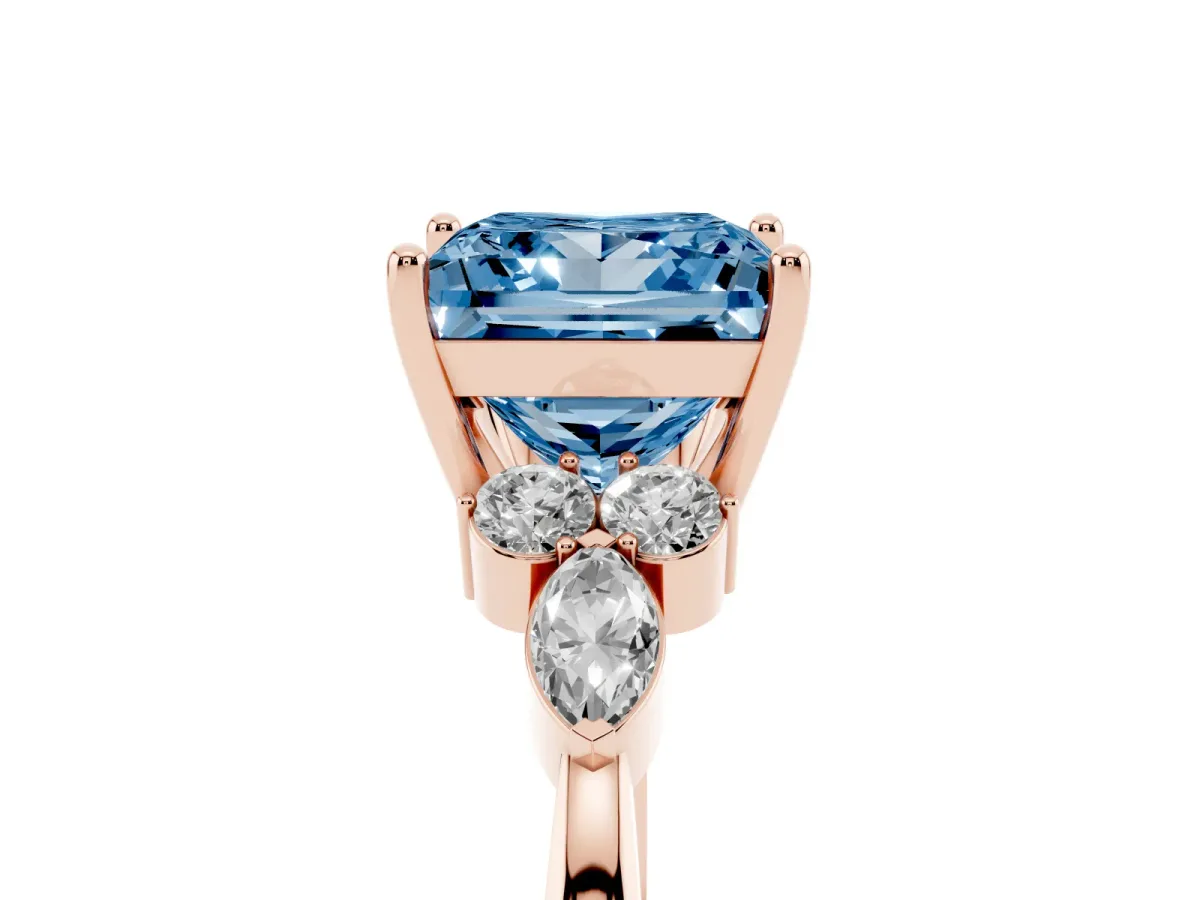 Fancy Blue Princess Cut Brilliant Diamond Solitaire Ring with Pear Side Stones and Four-Prong Setting Rose gold
