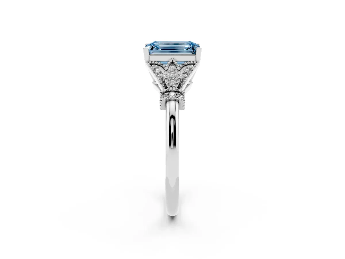 Fancy Blue Emerald Cut Diamond Solitaire Ring with Floral Filigree and Pave Accents White gold