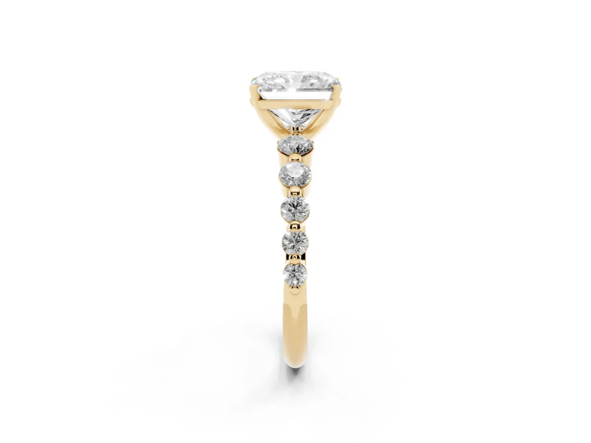 Radiant Cut Solitaire Diamond Ring with Pave Band and Four-Prong Setting Yellow gold
